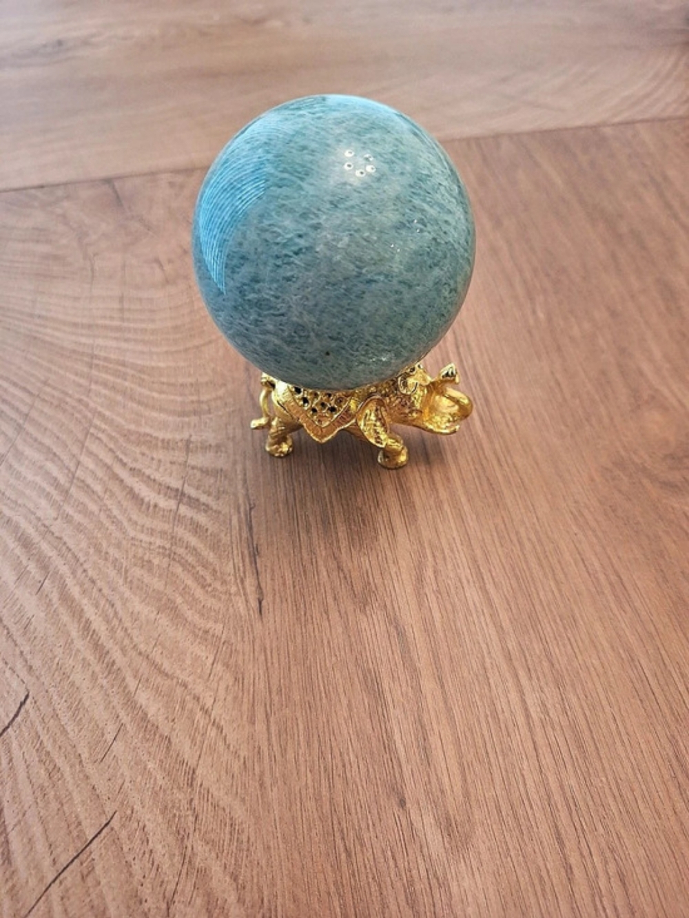 Polished Amazonite Sphere With Gold Elephant Holder